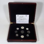 A Boxed Silver & Gold Plated Presentation Set Of B