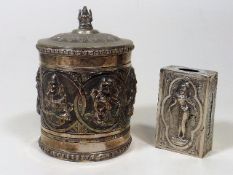 An Indian Silver Embossed Jar With Similar Vesta H