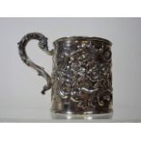 An Early 19thC. Embossed Silver Christening Mug