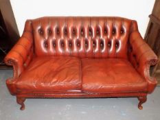 An Antique Style Leather Chesterfield Two Seater S