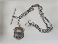 A Silver Albert Chain With Silver Fob