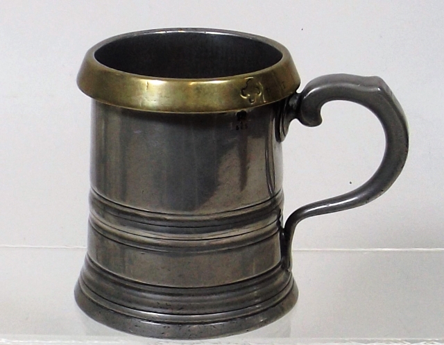 A Brass Rimmed Pewter Tankard