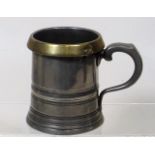 A Brass Rimmed Pewter Tankard