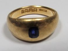 An 18ct Gold Ring With Sapphire