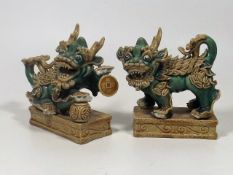 A Pair Of C.1920 Chinese Foo Dogs, One Lacking Hor