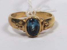 A 9ct Gold Ring With Sapphire