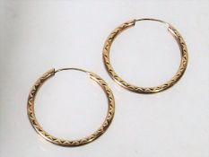 A Pair Of 9ct Gold Ladies Hoop Ear Rings