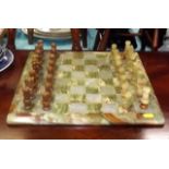 An Onyx Chess Board With Similar Pieces