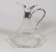A Crystal Ships Decanter With White Metal Fittings