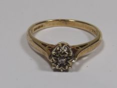 A 9ct Gold Ring With Small Diamond