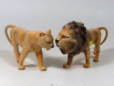 A Beswick Lion 24cm Long, Tail Repaired With Lione
