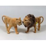 A Beswick Lion 24cm Long, Tail Repaired With Lione