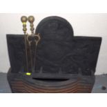 A Cast Fireback With Grate, Brass Companion Set, T