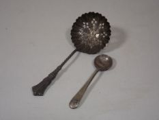 A Silver Sifter Twinned With Silver Mustard Spoon