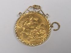 A 1903 Full Gold Sovereign With Yellow Metal Mount