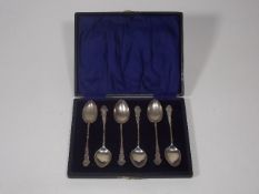 A Boxed Set Of Silver Teaspoons