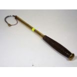 An Antique Brass Fishing Gaff With Wood Handle