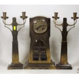 An Archibald Knox Style Clock Garniture Set