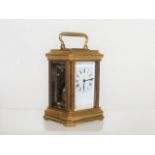 A Miniature Brass Carriage Clock