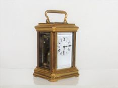 A Miniature Brass Carriage Clock