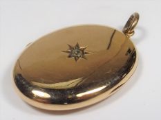 A Victorian 9ct Gold Locket With Diamond