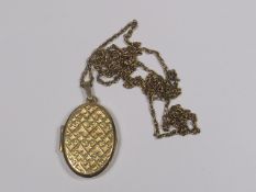 A 9ct Gold Locket With Necklace