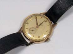 A Gents 18ct Gold Smiths Watch