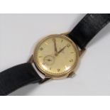 A Gents 18ct Gold Smiths Watch