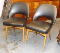 A Pair Of Retro Danish Style Leather Dining Chairs