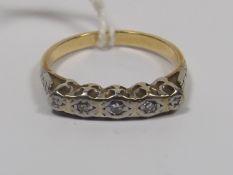 A 9ct Gold Ring With Small Diamonds