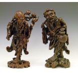 Two 19th Century Chinese carved hardwood figures depicting Fukurokuju, 40cm high and a Rakan, 39.5cm