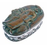 Early 19th Century carved fruitwood oval box, the cover decorated with a full length figure of a