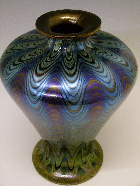 Iridescent glass baluster shaped vase having blue, green and yellow wavy decoration, 19.5cm high - Image 2 of 7