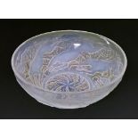 Lalique 'Chiens' bowl, opalescent blue, moulded mark to the interior, 24cm diameter Condition: