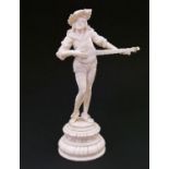 19th Century Continental carved ivory figure of a Minstrel playing a lute, probably Italian,