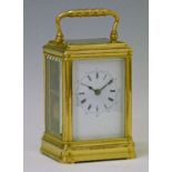 Late 19th Century French brass Cannelee cased carriage clock by Drocourt of Paris, the white