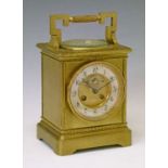 Late 19th/early 20th Century brass cased carriage style mantel clock, the dial with silvered chapter