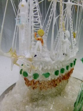 Nailsea type glass frigger in the form of two sailing ships and a lighthouse, displayed beneath a - Image 8 of 8