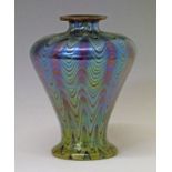 Iridescent glass baluster shaped vase having blue, green and yellow wavy decoration, 19.5cm high