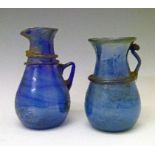 Late 19th/early20th Century Roman style mottled blue glass ewer, 17cm high together with a similar
