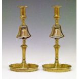 Pair of 19th Century brass 'Tavern' candlesticks, each having a knopped stem with a central bell and