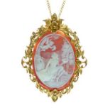 9ct gold shell cameo brooch/pendant, carved with a cherub about to crown a maiden, the foliate frame