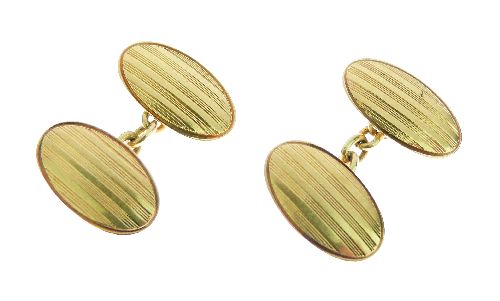 Pair of 18ct gold cufflinks, Birmingham 1924, the oval panels with linear decoration, chain link