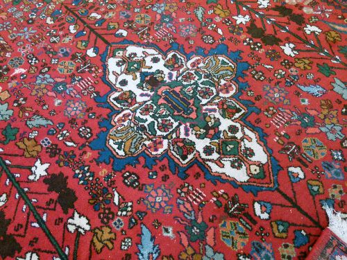 Abadeh rug having a central medallion amongst tight-knit foliage on a red ground within multi - Image 6 of 6