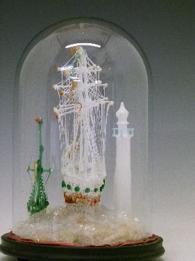 Nailsea type glass frigger in the form of two sailing ships and a lighthouse, displayed beneath a - Image 4 of 8