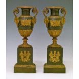 Pair of 19th Century French Empire style ormolu mounted bronze and bronzed metal two handled urns,