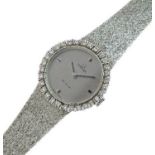 Omega, De Ville - Lady's 18ct white gold diamond set bracelet watch, London import marks for 1972,