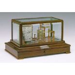 Mahogany cased barograph by J.H. Steward Ltd of London having bevelled glass panels and fitted one