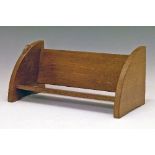 Robert 'Mouseman' Thompson of Kilburn - An oak bookrack, having quadrant shaped end panels,