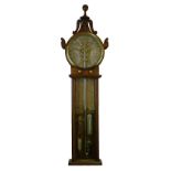 Admiral Fitzroy 'The Atmoscope' oak cased barometer having a carved pediment, circular silvered